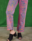 Work Pants in Electric Leopard front leg close up on Betty