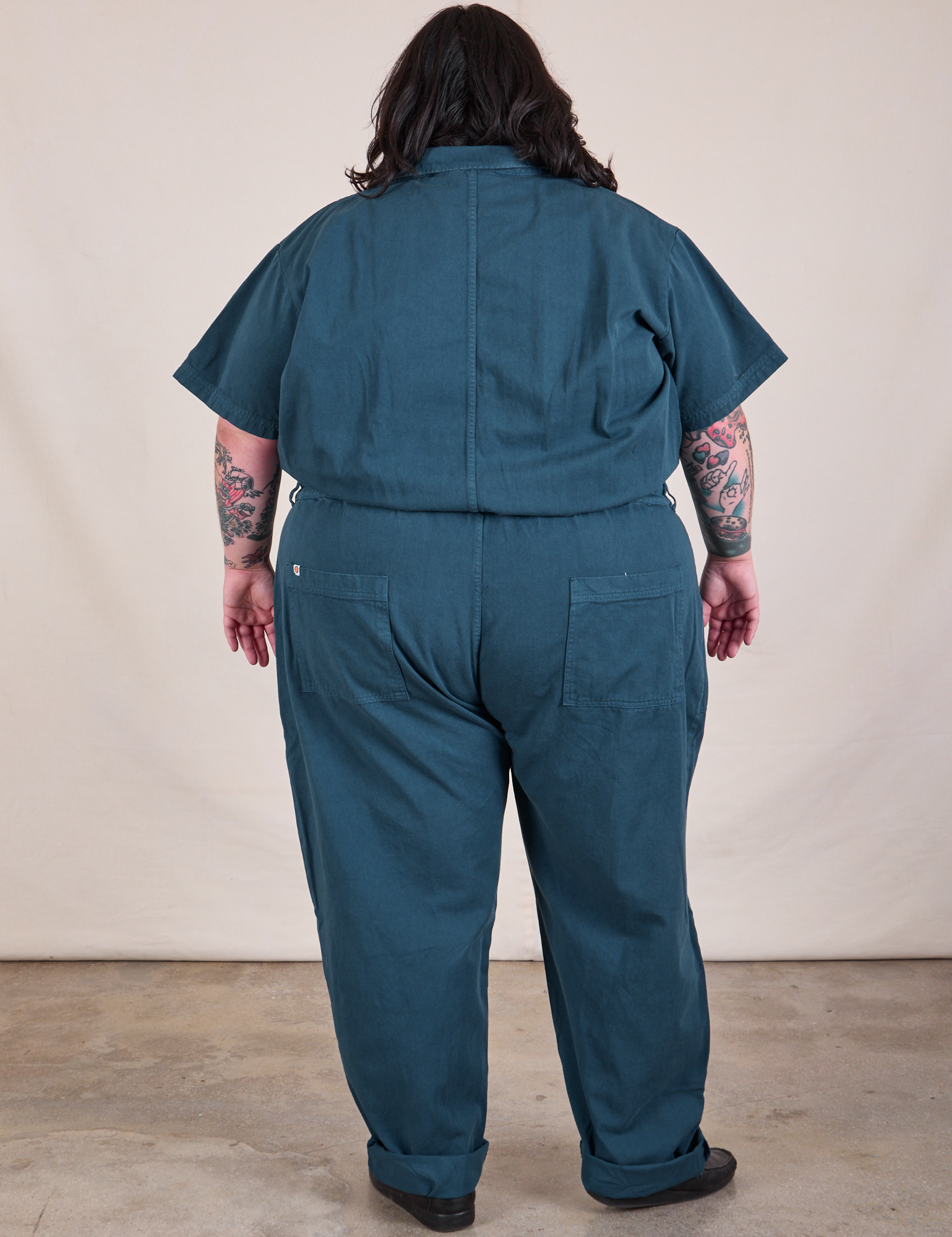 Back view of Long Jumpsuit in Lagoon on Sam