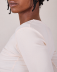 Long Sleeve V-Neck Tee in Vintage Tee Off-White shoudler close up on Cheyann