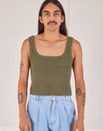 Anthony is 5’10” and wearing S Square Neck Tank in Surplus Green