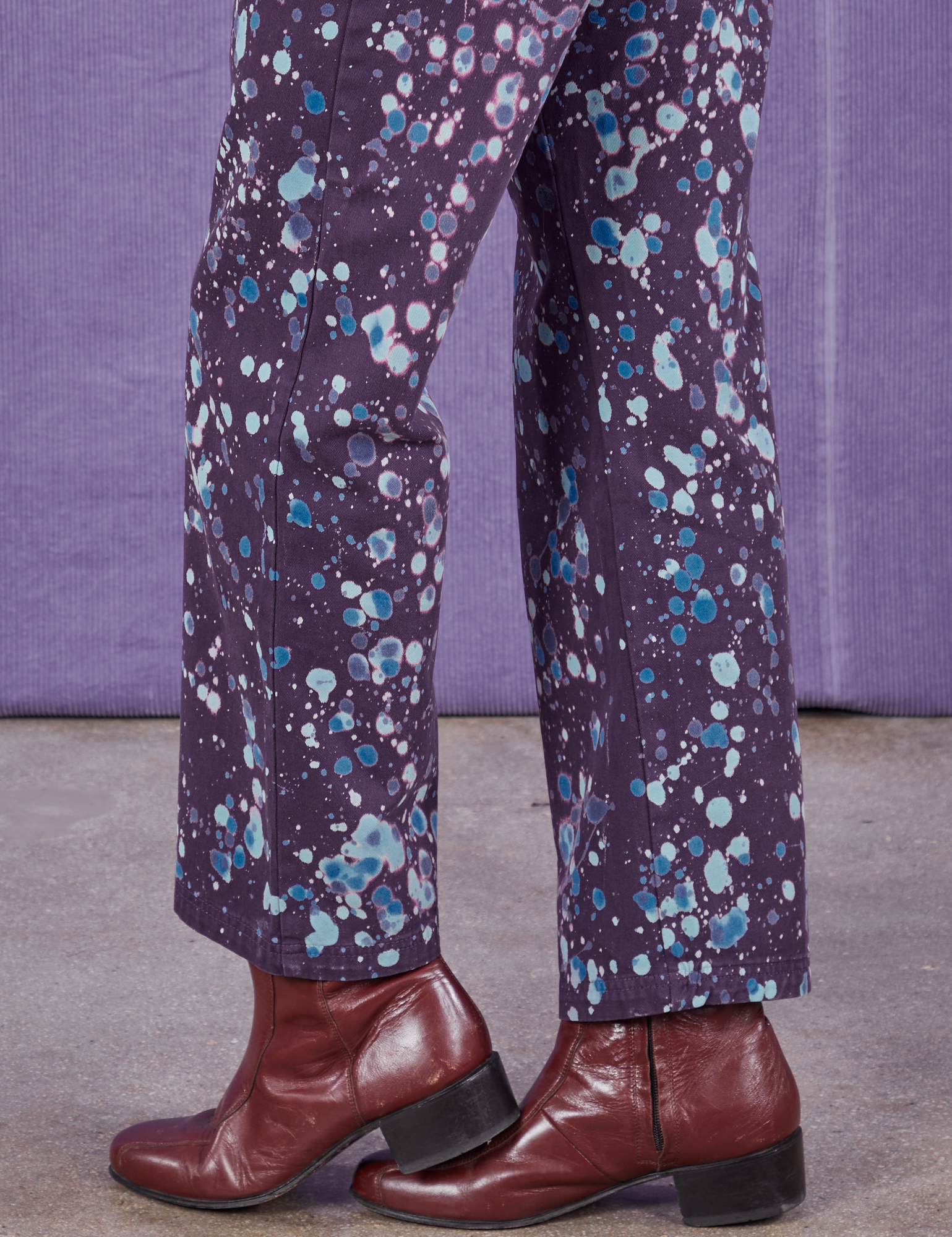 Pant leg close up of Marble Splatter Work Pants in Nebula Purple on Jesse