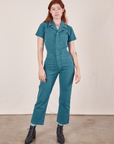Alex is 5'8" and wearing XS Short Sleeve Jumpsuit in Marine Blue
