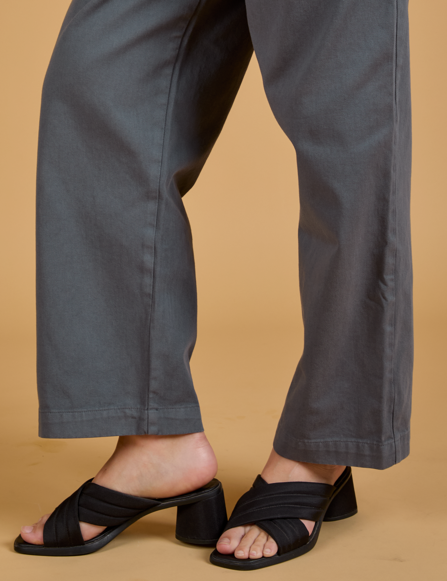 Baggy Mid-Rise Trousers in Slate Grey pant leg side view close up on Alex