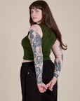 Angled back view of Muscle Tee in Evergreen on Sydney