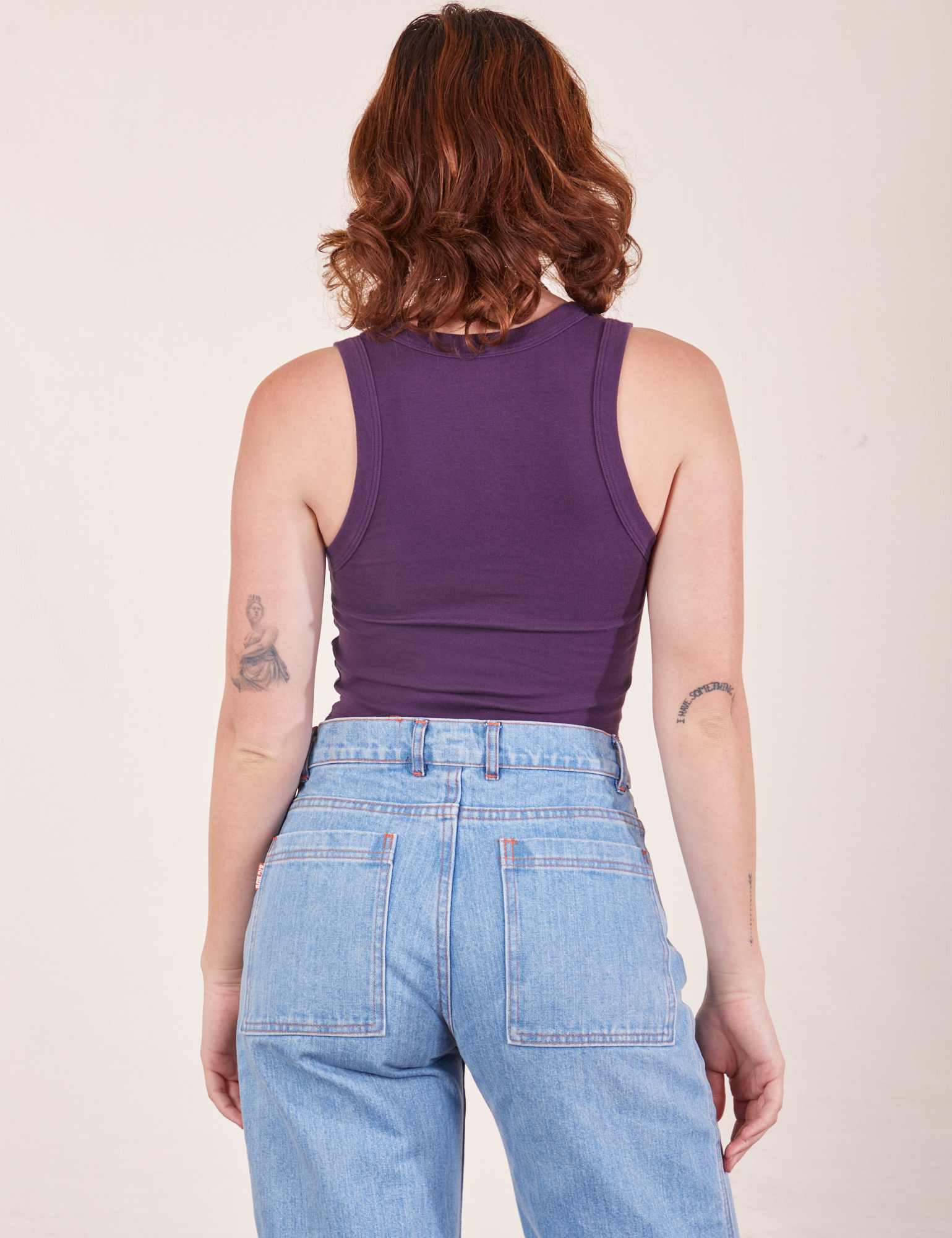 Back view of Cropped Tank Top in Nebula Purple worn by Alex