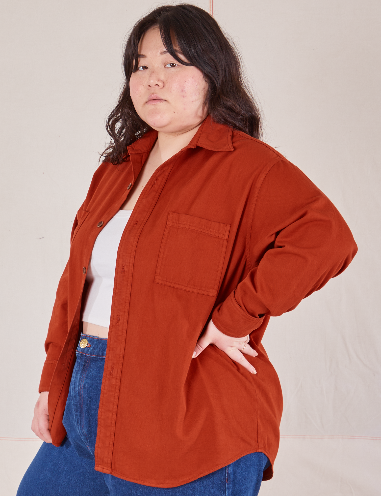 Angled view of Oversize Overshirt in Paprika on Ashley