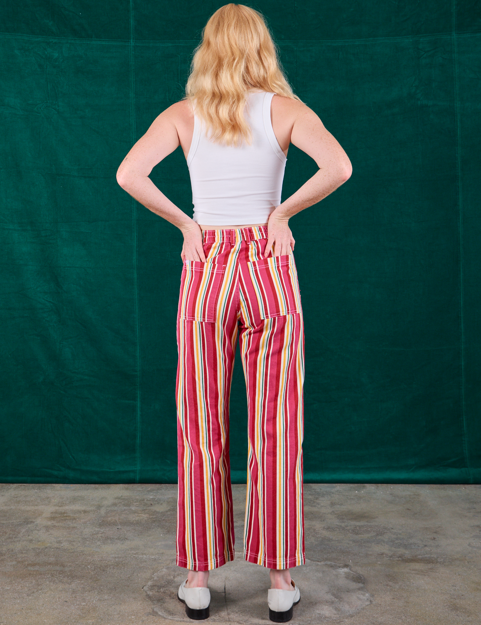 Back view of Stripe Work Pants in Cherry Candy and Cropped Tank in vintage tee off-white on Margaret