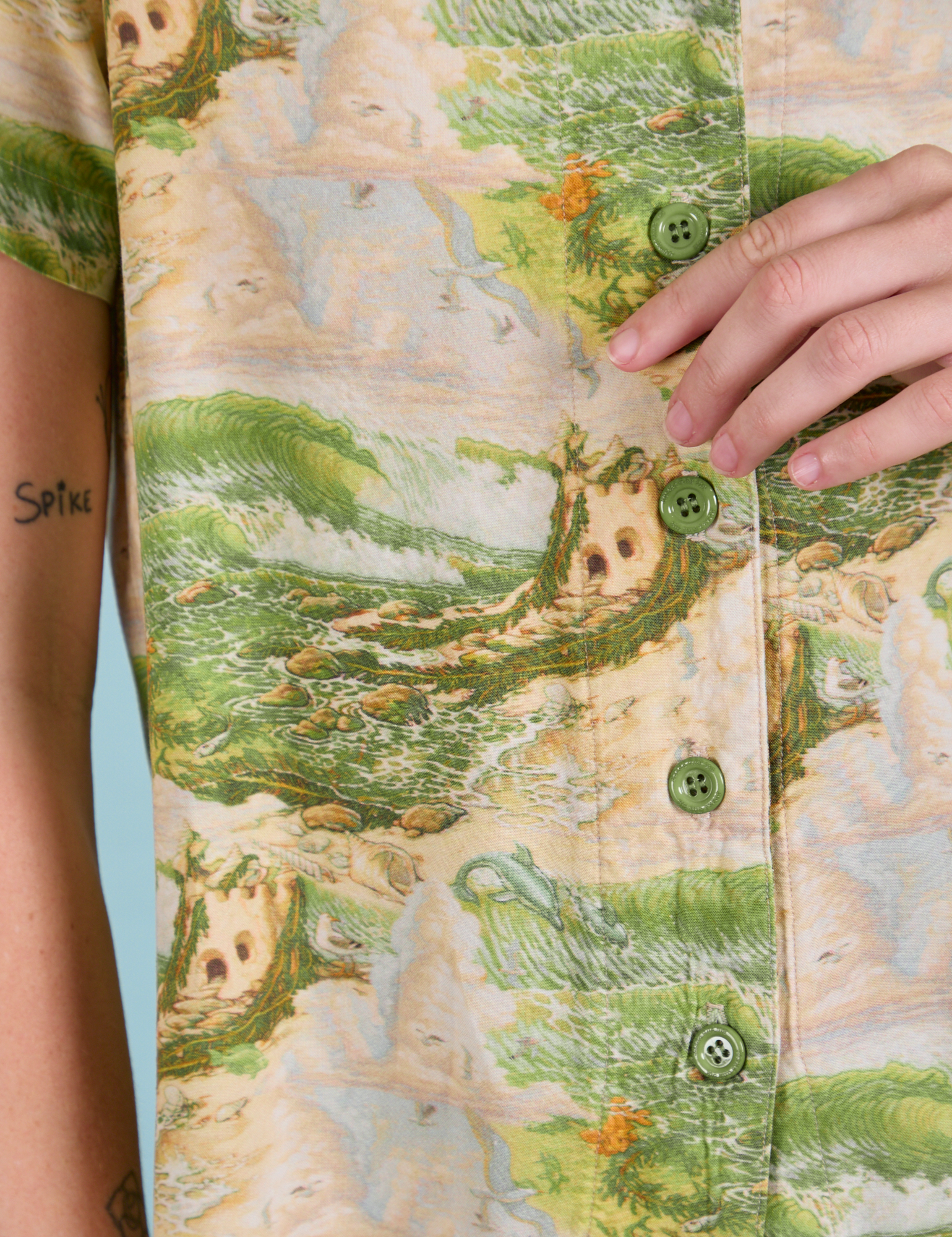 Pantry Button-Up in Ocean and Sky close up. Green buttons.