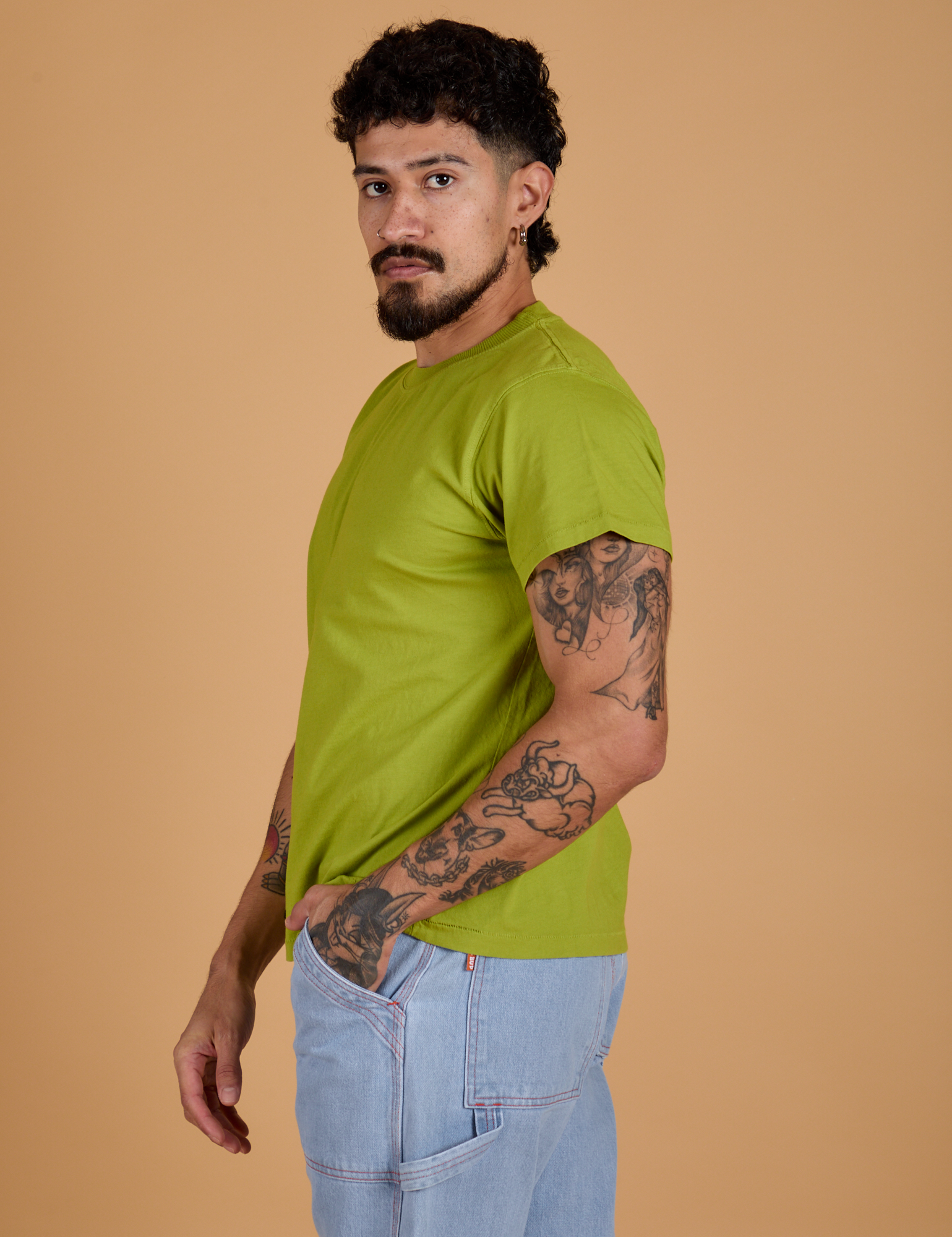 Organic Vintage Tee in Gross Green side view on Jesse