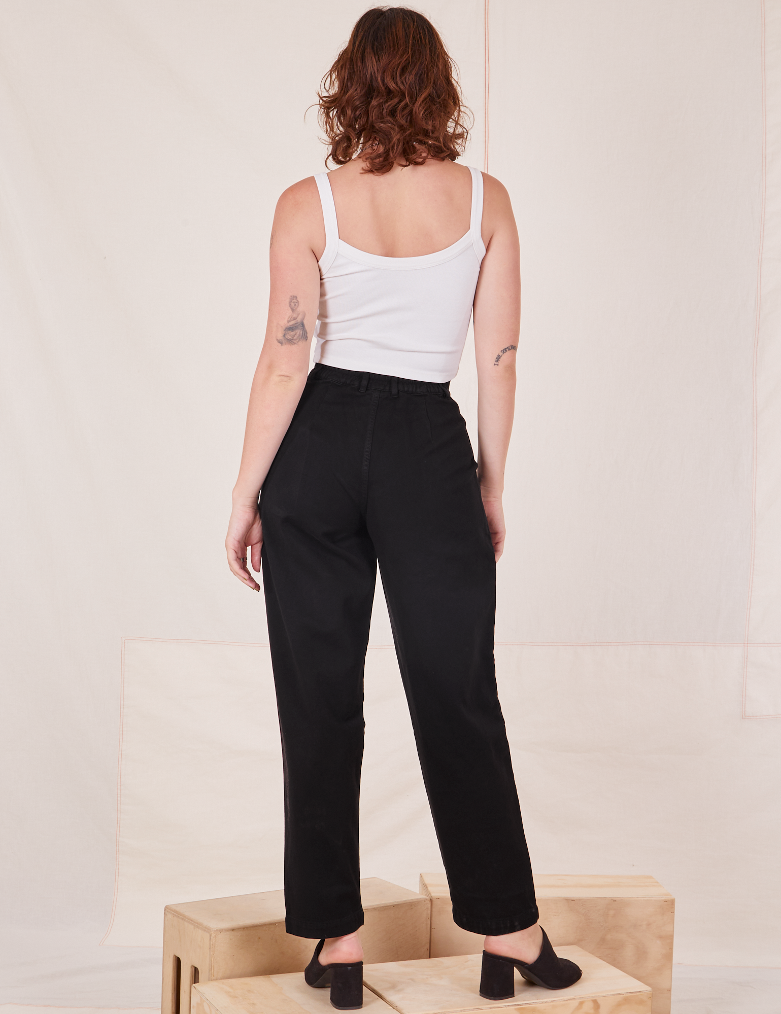 Back view of Organic Trousers in Basic Black worn by Alex