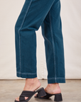 Original Overalls in Lagoon pant leg side view close up on Alex