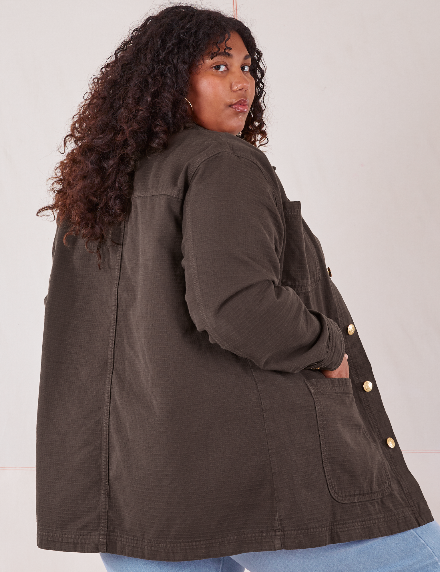 Field Coat in Espresso Brown angled back view on Morgan