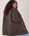 Field Coat in Espresso Brown angled back view on Morgan