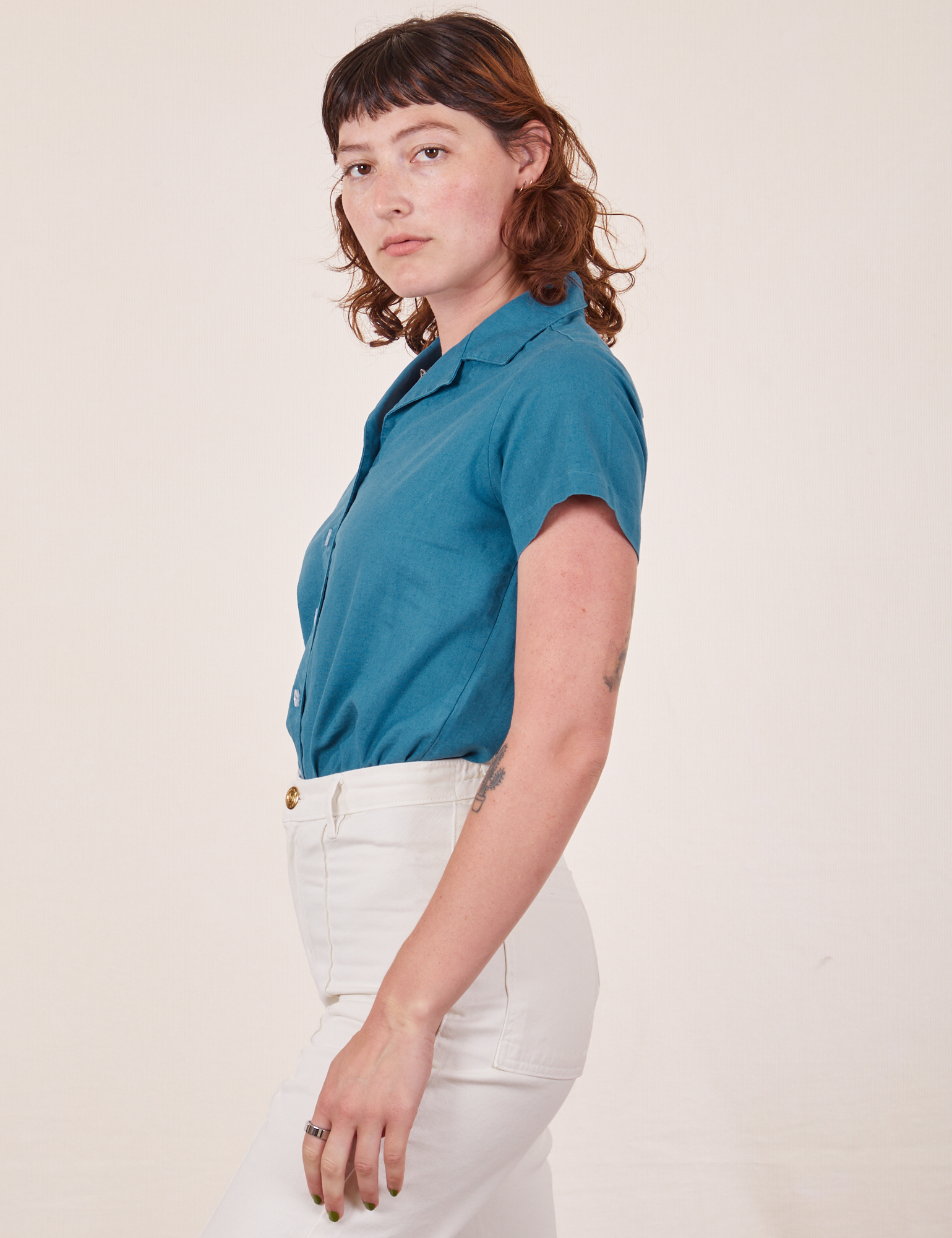 Side view of Pantry Button-Up in Marine Blue worn by Alex