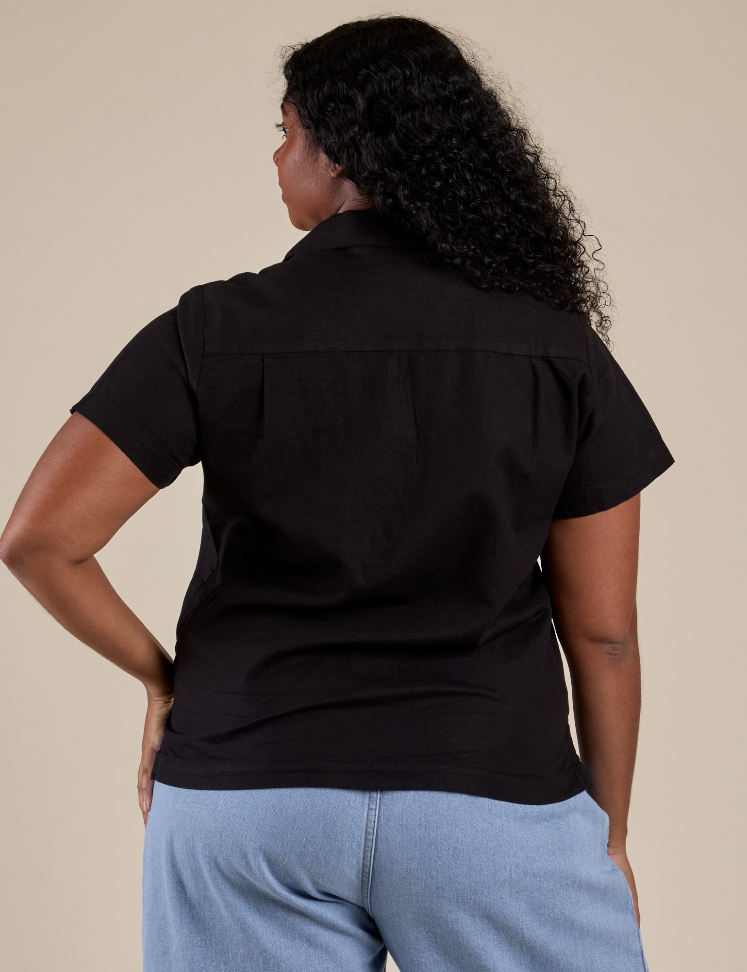 Pantry Button-Up in Basic Black back view on Meghna