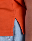 Close up of side vent of Pantry Button-Up in Chili Red