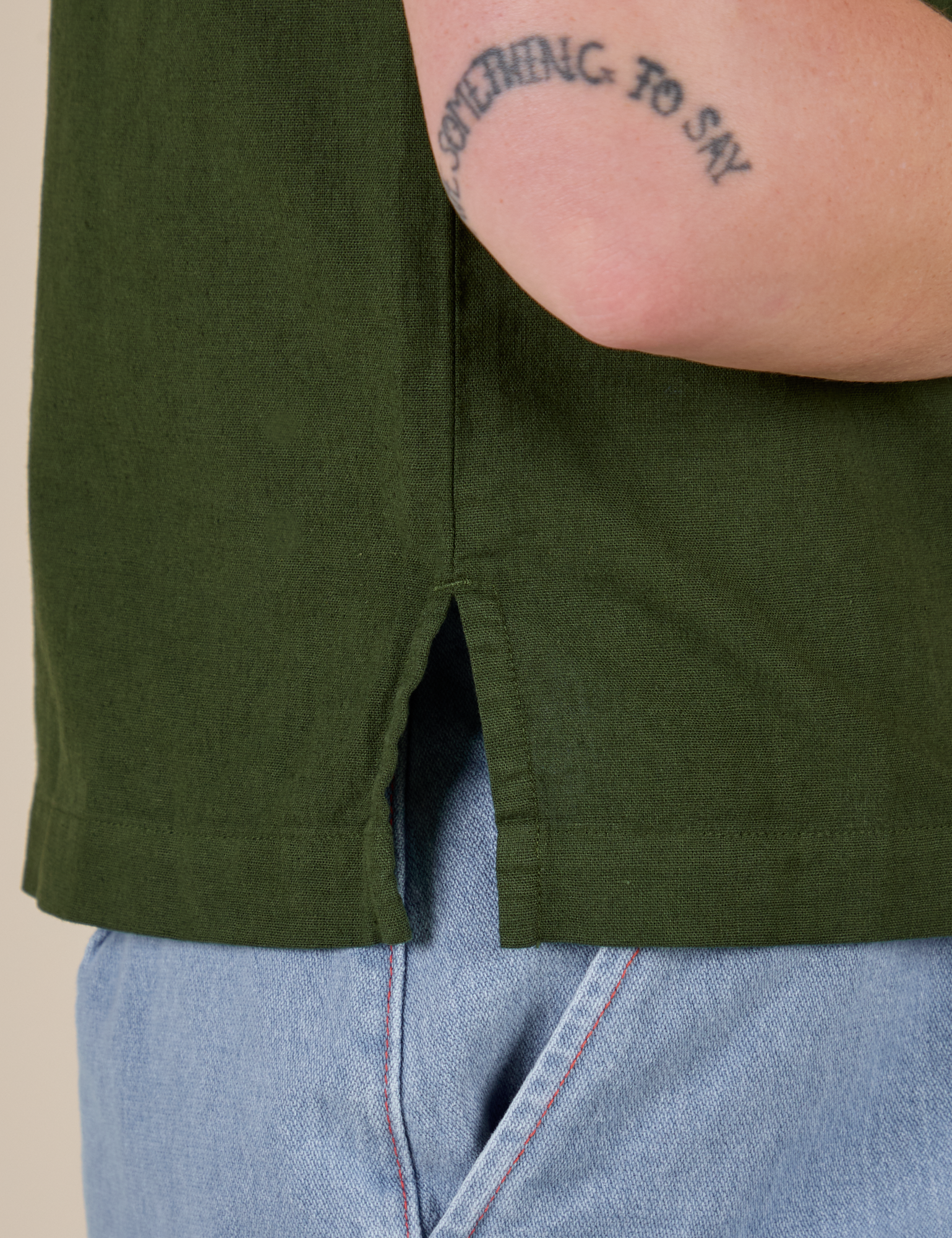 Close up side vent of Pantry Button-Up in Evergreen on Alex