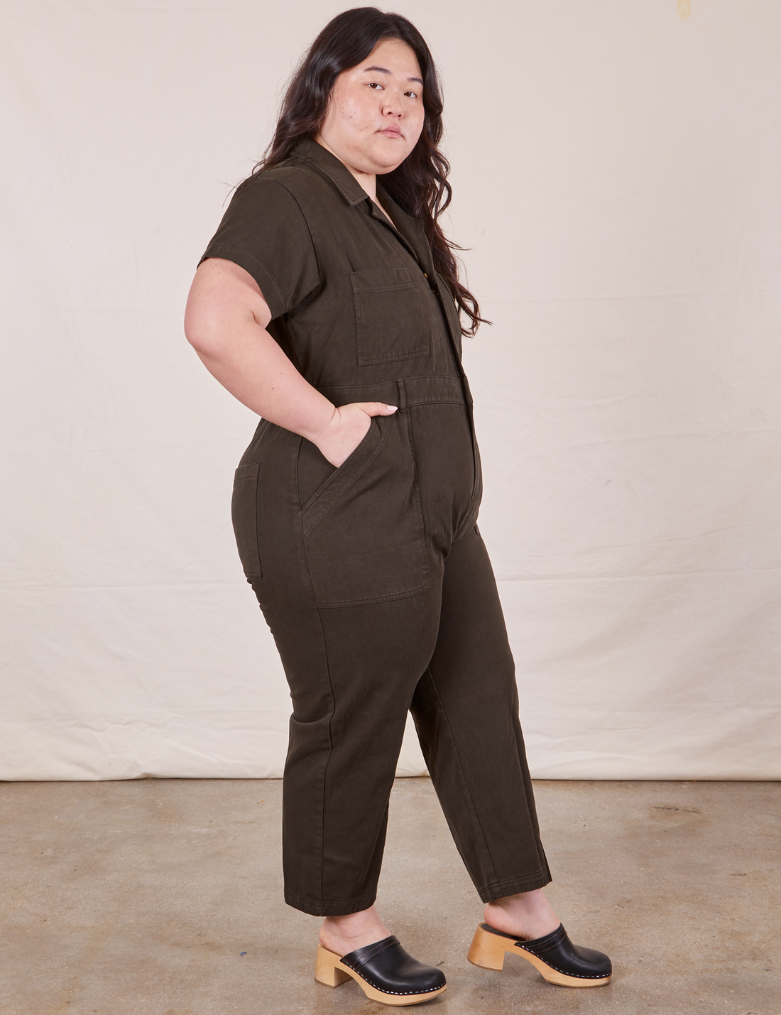 Petite Short Sleeve Jumpsuit in Espresso Brown side view on Ashley