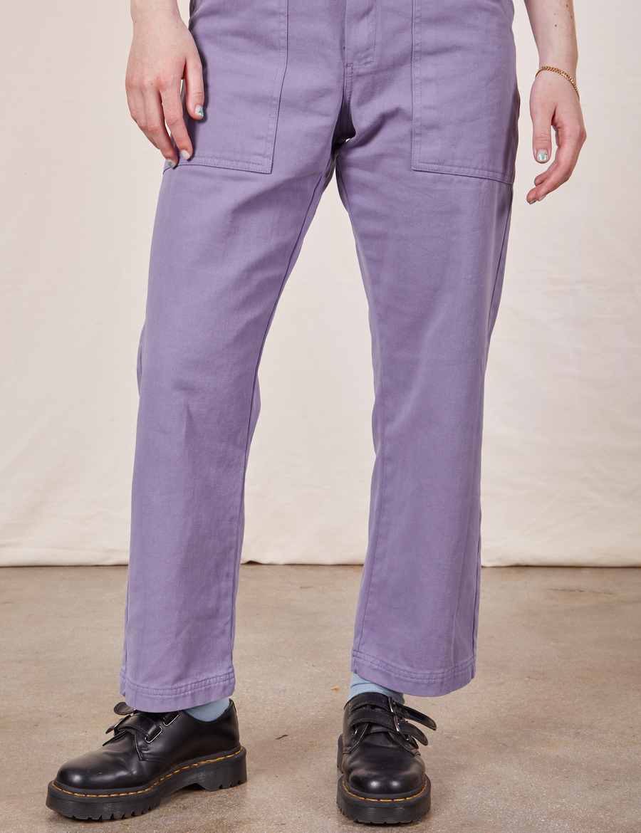 Pant leg close up of Petite Short Sleeve Jumpsuit in Faded Grape worn by Hana