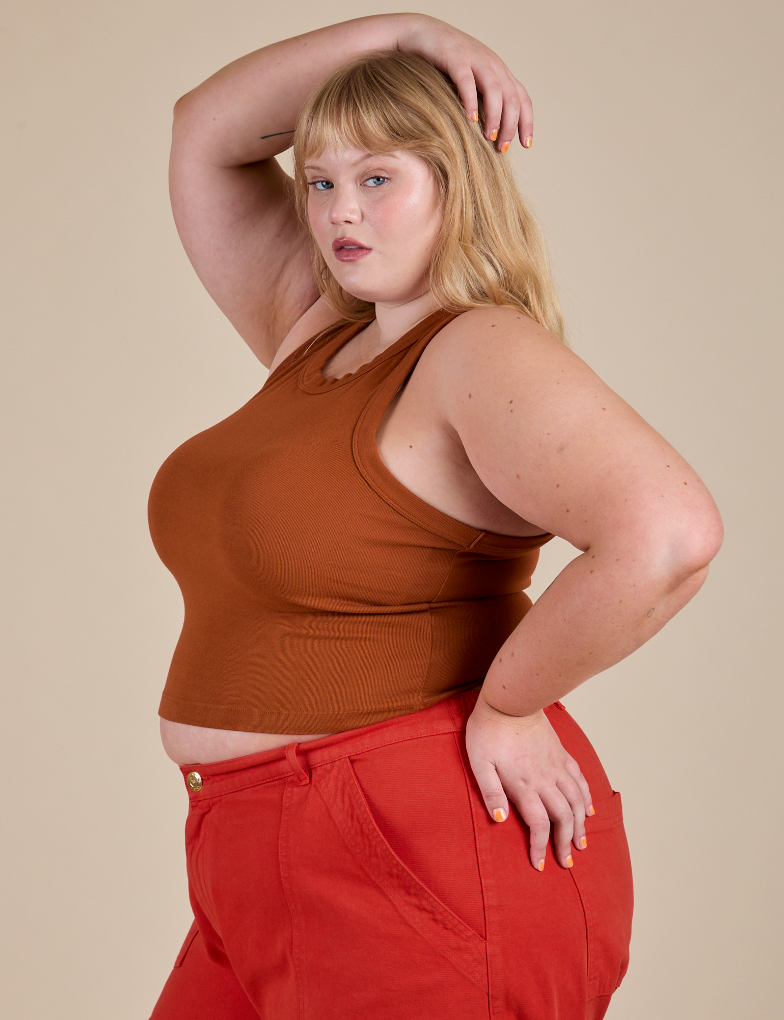 Racerback Tank in Burnt Terracotta side view on Juliet