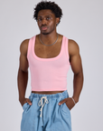 Isaac is 5’10” and wearing M Cropped Tank Top in Baby Pink