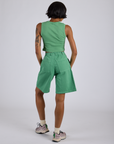 Back view of Longline Work Shorts in Seafoam Green and matching Muscle Tee on Kira