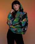 Oversized Hoodie in Rainbow Magic Waters worn by Alex