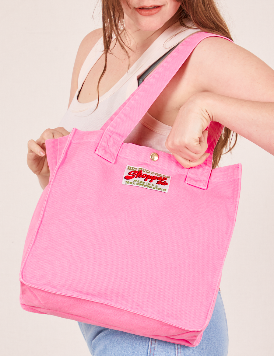 Shopper Tote Bag in Bubblegum Pink worn as a shoulder bag on Allison