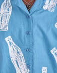 Soda Bottle Pantry Button-Up in Greek Blue close up on Jerrod