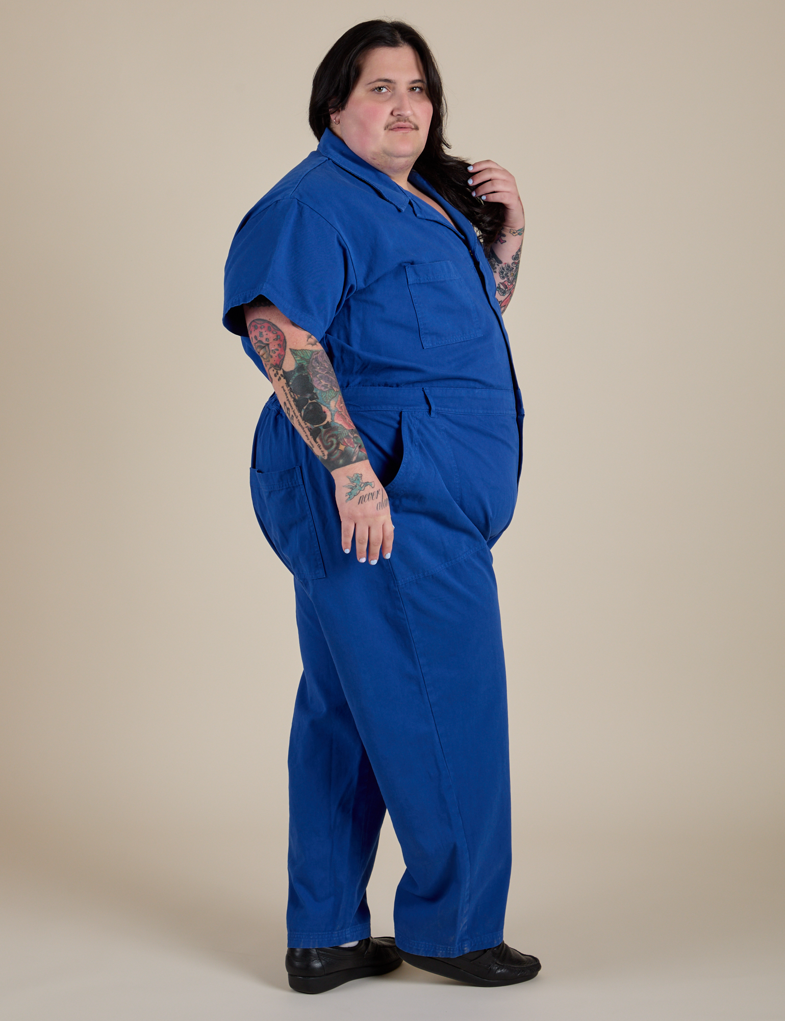 Side view of Short Sleeve Jumpsuit in Royal Blue on Sam
