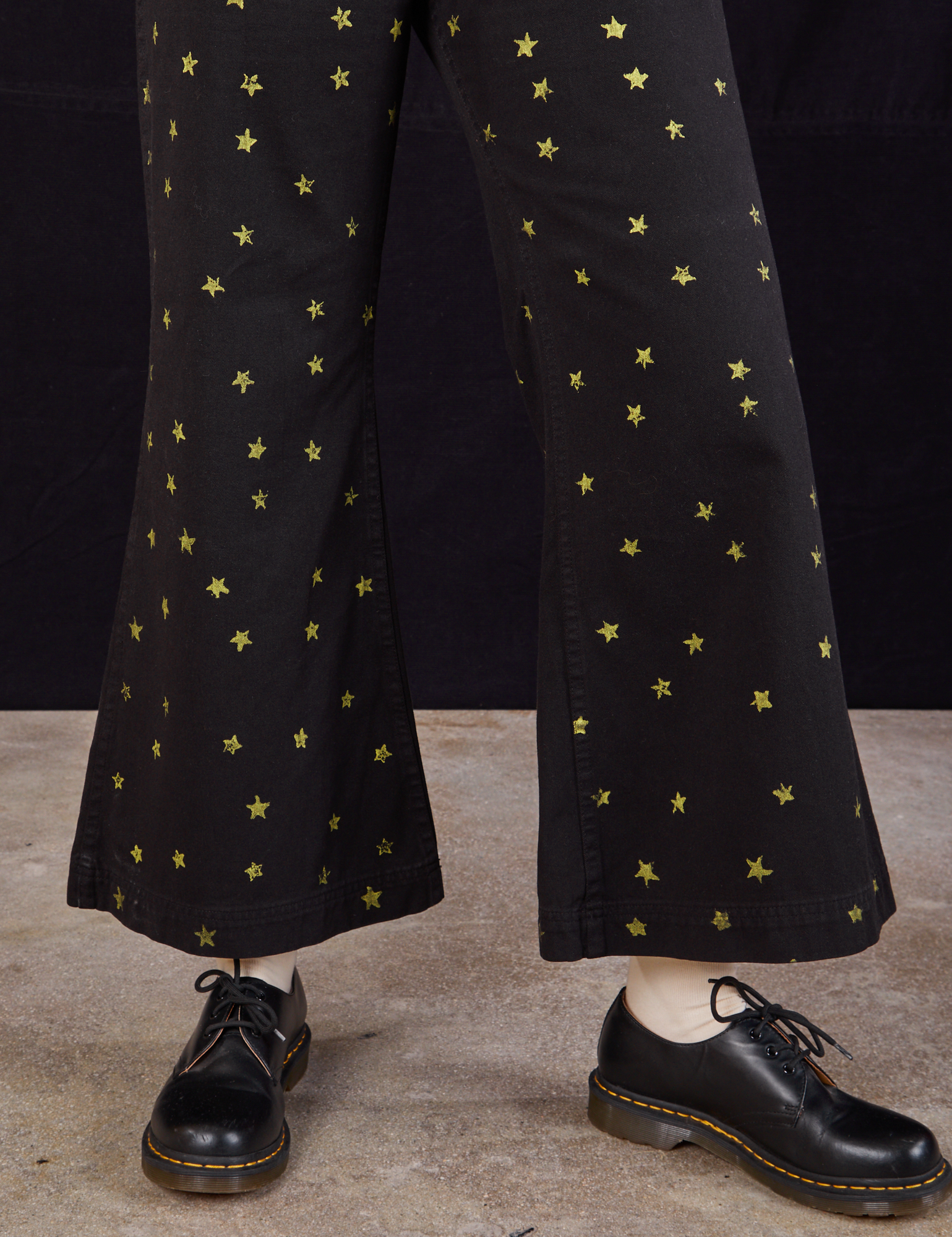 Star Bell Bottoms in Black pant leg close up on Margaret