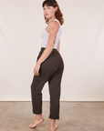 Angled back view of Cropped Rolled Cuff Sweatpants in Espresso Brown on Alex