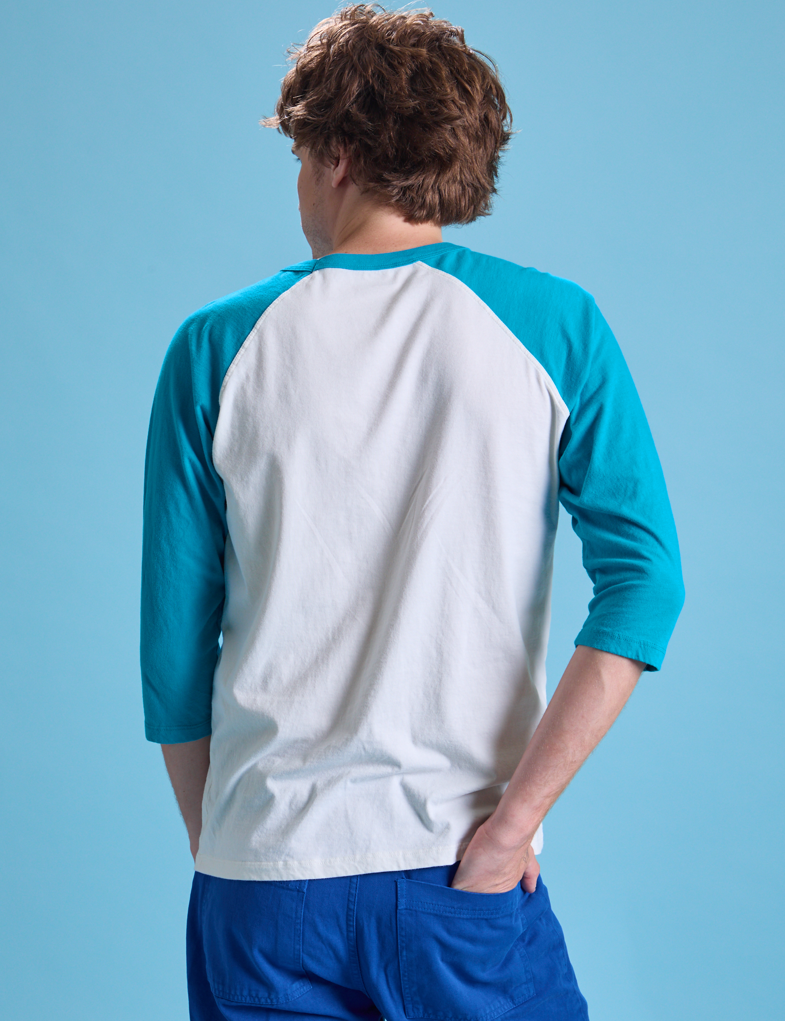 Taxi Raglan Tee in San Francisco back view on Quinn