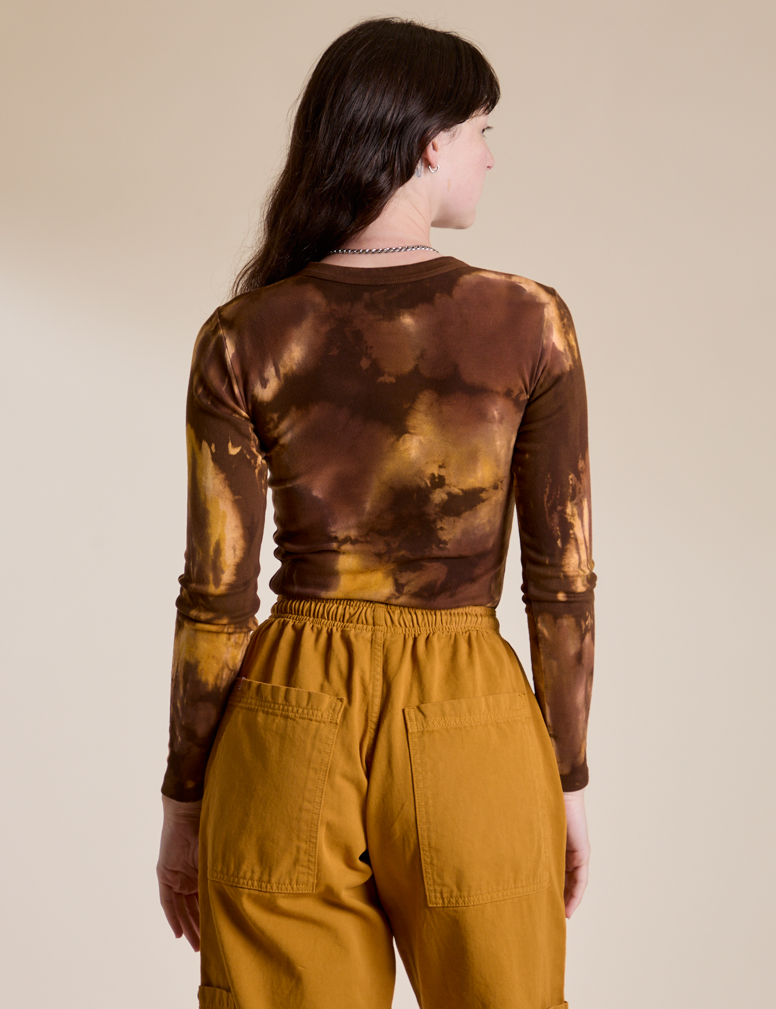 Long Sleeve Baby Tee in Honey Brown back view on Alex