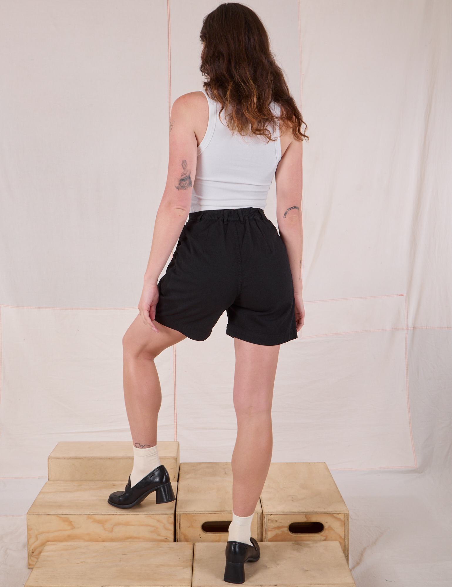 Trouser Shorts in Basic Black back view on Alex