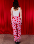 Back view of Paintstamped Heart Work Pants in Bubblegum Pink and Cami in Vintage Tee Off-White on Alex