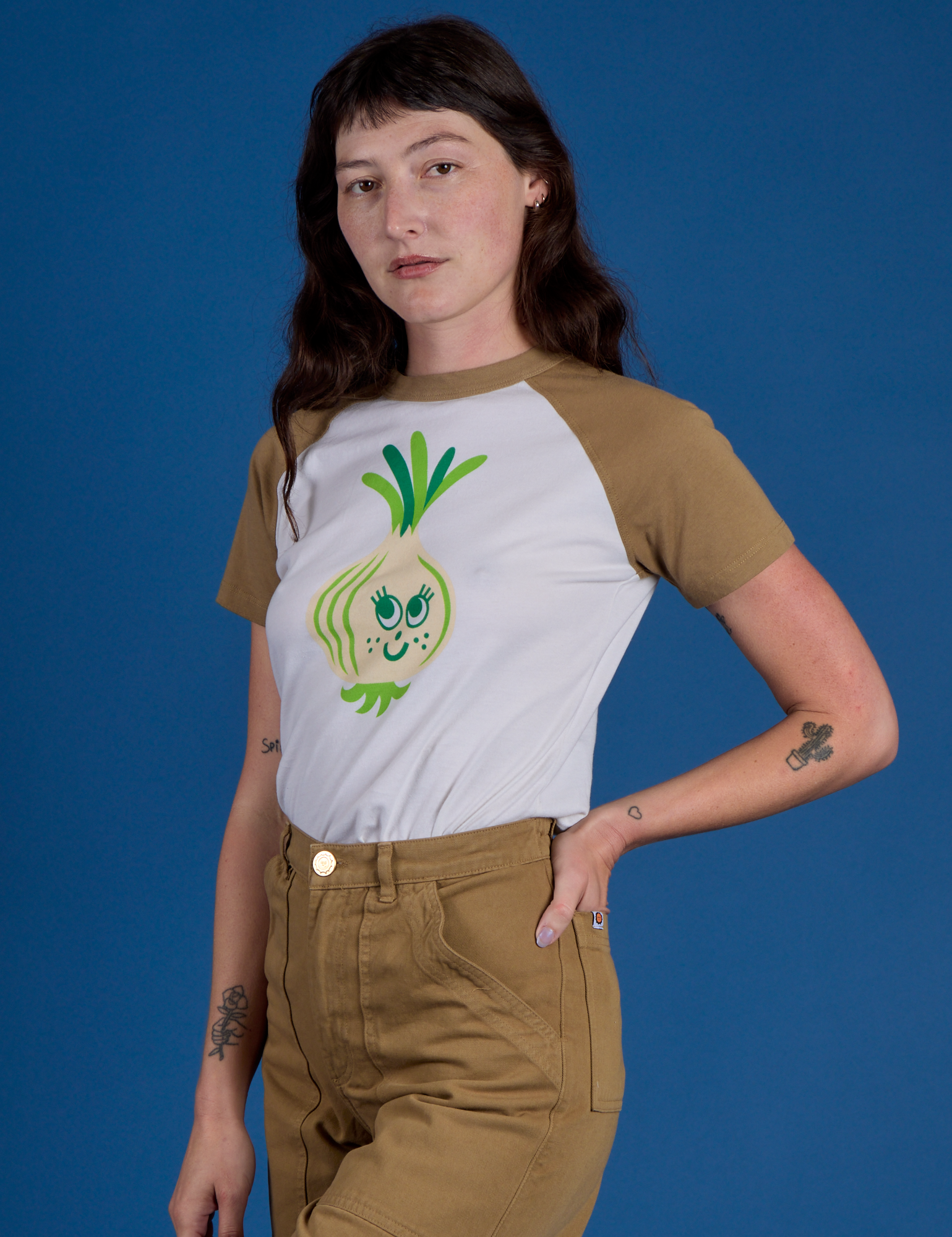 Produce Raglan Tee in Onion angled front view on Alex
