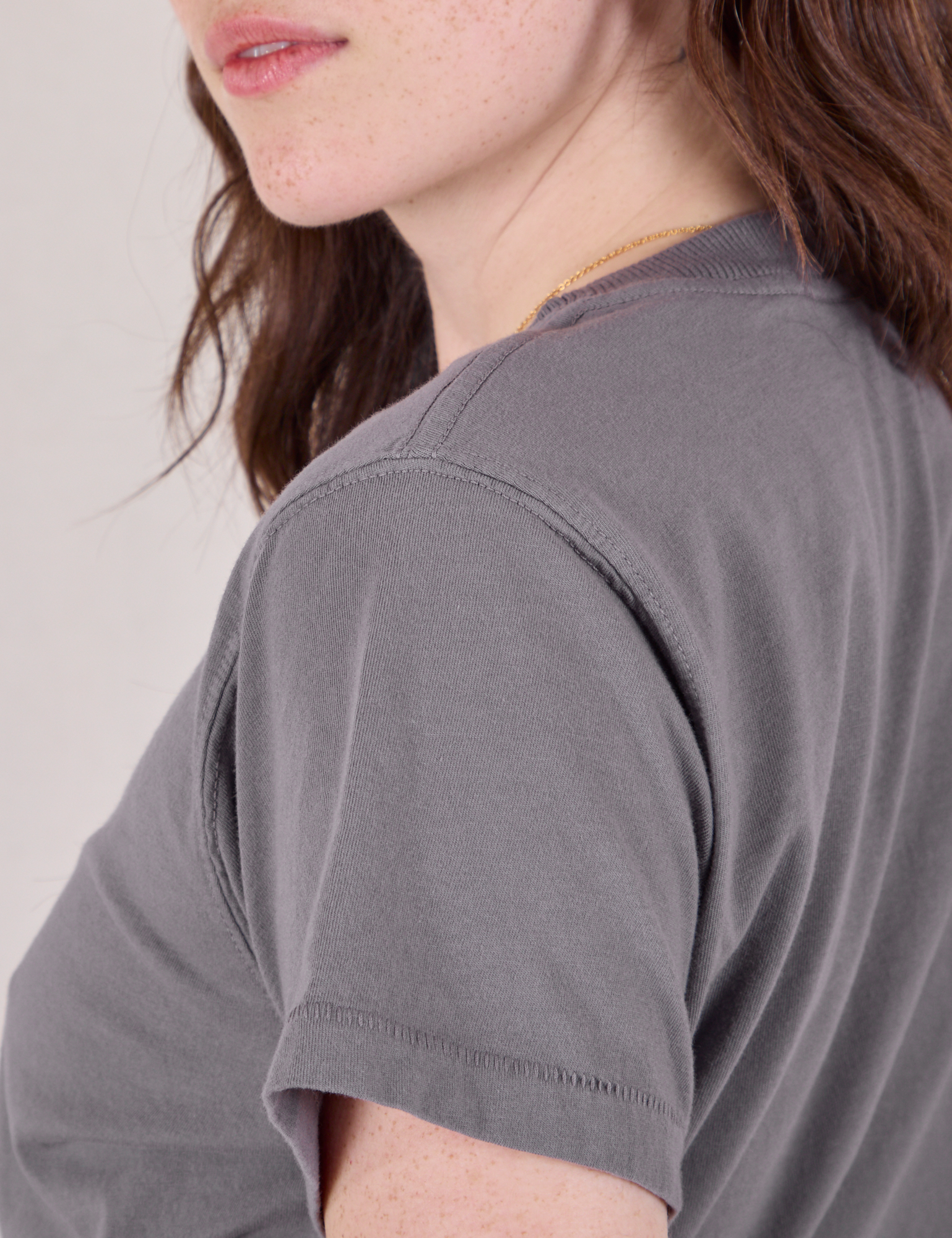 Shoulder close up of Organic Vintage Tee in Washed Grey on Hana