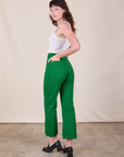 Angled back view of Western Pants in Forest Green on Alex