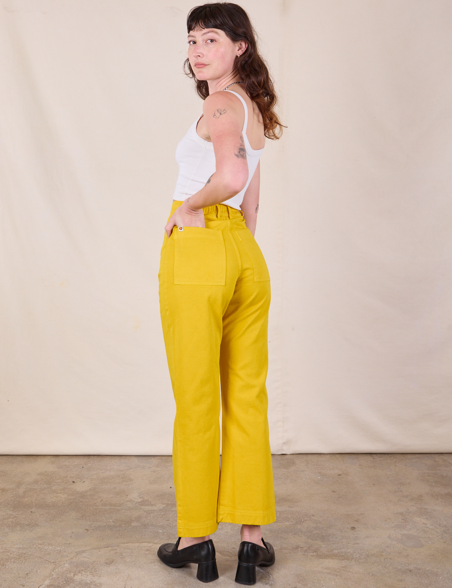 Back view of Western Pants in Golden Yellow on Alex