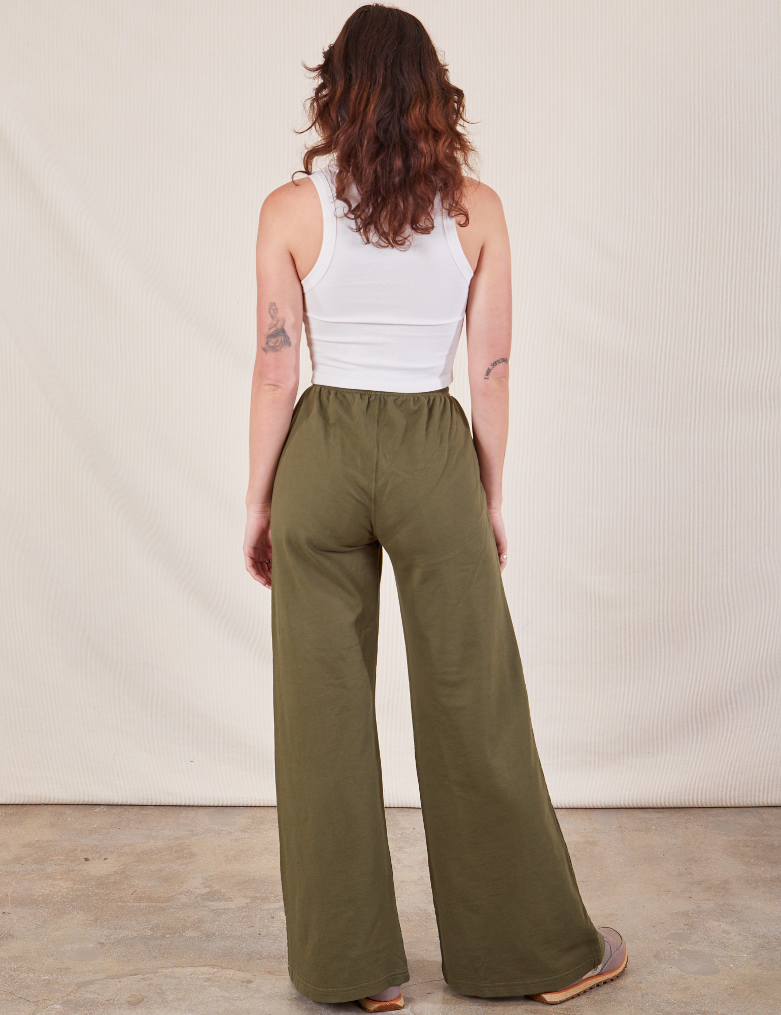 Wide Leg Sweat Pants in Surplus Green back view on Alex