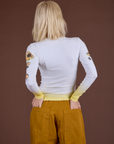 Floral Long Sleeve Baby Tee in Yellow back view on Madeline