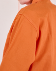 Shoulder close up of Denim Work Jacket in Construction Orange on Quinn