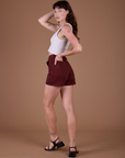 Classic Work Shorts in Red Wine angled back view on Alex