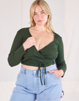 Lish is 5'8" and wearing size 3 Wrap Top in Swamp Green