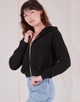 Cropped Zip Hoodie in Basic Black front angled view on Alex