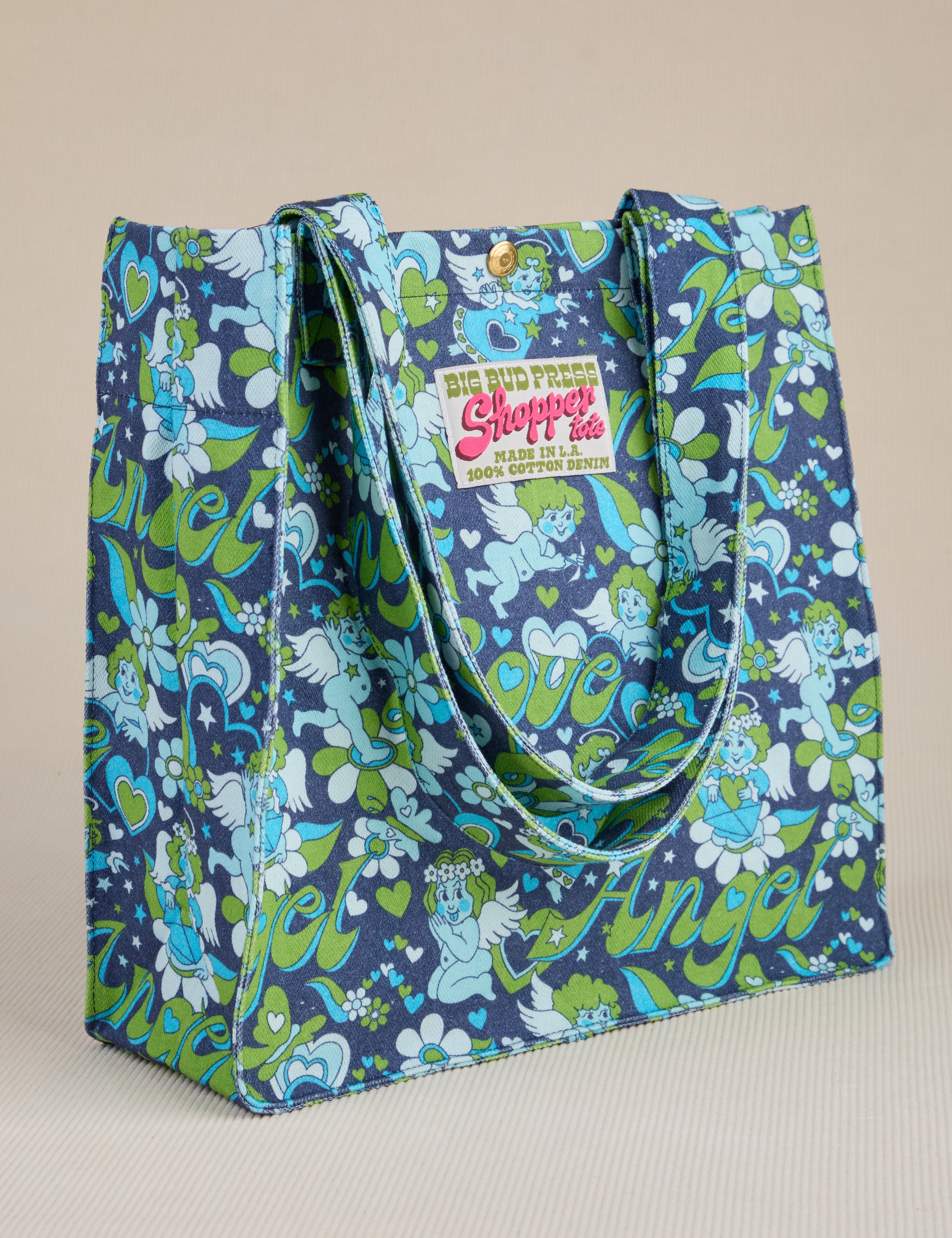 Angled front view of Angel Printed Shopper Tote