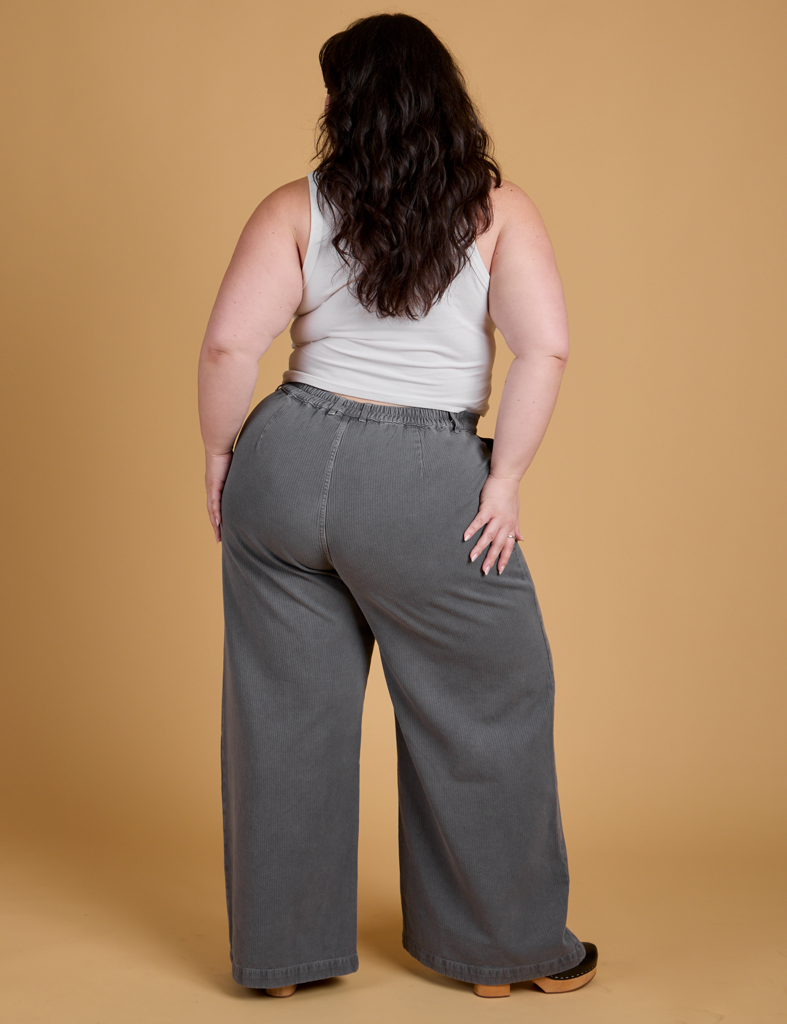 Heritage Wide Leg Trousers in Washed Grey back view on Ashley