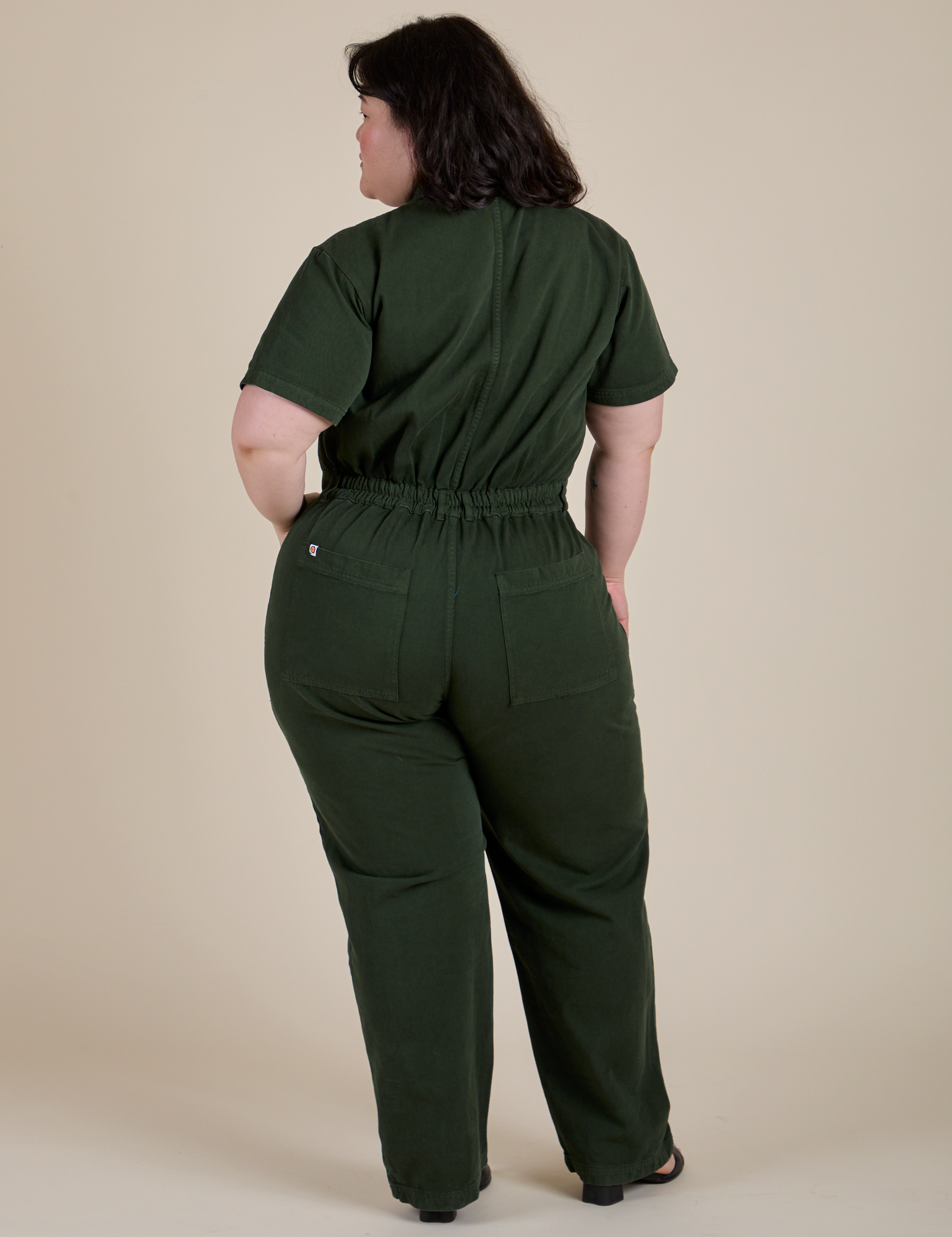 Back view of Short Sleeve Jumpsuit in Swamp Green on Ashley