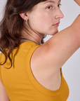 Cropped Tank Top in Mustard Yellow shoulder close up on Alex